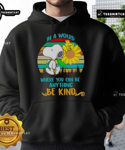 Happy Snoopy in a sunflower design on a retro hoodie with the quote 'In a world where you can be anything, be kind.'