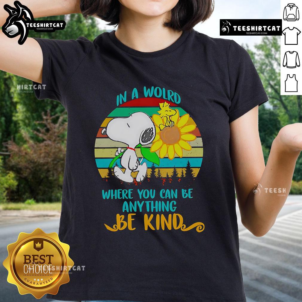 Happy Snoopy Sunflower In A World Where You Can Be Anything Be Kind Retro Ladies-Tee Happy Snoopy with sunflowers on a retro ladies tee, showcasing the message 'In a world where you can be anything, be kind'.