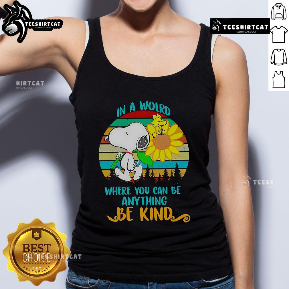 Happy Snoopy Sunflower In A World Where You Can Be Anything Be Kind Retro Tank Top Alt Text: Happy Snoopy with sunflowers on a retro tank top, featuring the quote In a world where you can be anything, be kind.