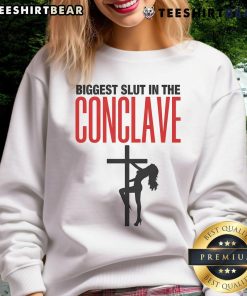 Alt Text: Hot Biggest Slut In The Conclave Sweatshirt featuring bold graphic design and casual style for trendy fashion lovers.