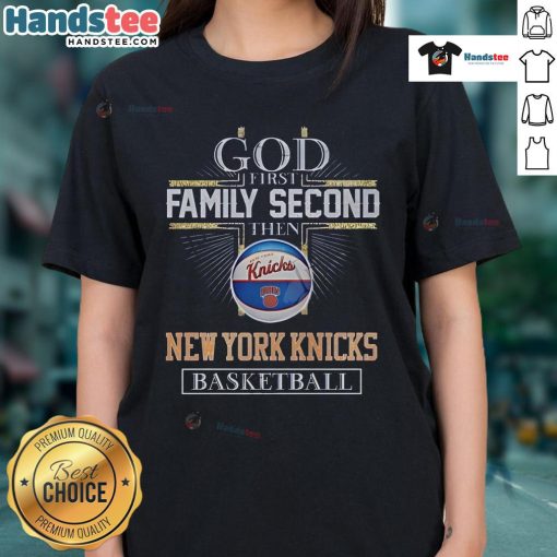 Alt Text: New York Knicks Basketball God graphic tee for men, featuring 'First Family, Second' slogan in team colors.