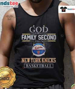 New York Knicks basketball fan wearing a 'God First Family Second' tank top, showcasing team spirit and style.