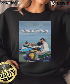 Cozy 'Nice Almost Friday' Sweeney and McBride sweatshirt, perfect for casual outings and relaxed weekends.