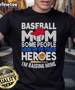 Alt Text: Nice Baseball Mom T-Shirt featuring 'Some People Look Up To Their Heroes, Im Raising Mine' design.