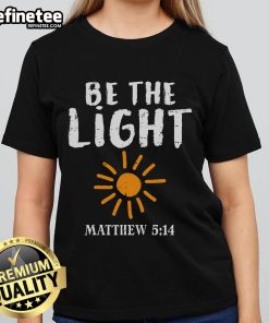 Christian ladies tee featuring 'Be The Light' design inspired by Matthew 5:14, perfect for faith-filled fashion.