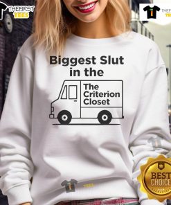Alt Text: Woman wearing the Nice Biggest Slut in the Criterion Closet sweatshirt, showcasing a unique graphic design and casual style.