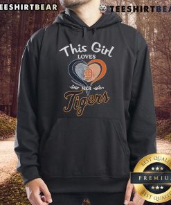 Girl wearing a Detroit Tigers hoodie with a heart fingerprint design, showcasing her love for the team.