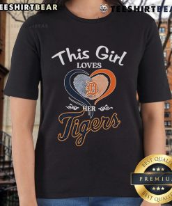 Girl wearing a Detroit Tigers heart fingerprint tee, showcasing her love for the team in a stylish and fun way.