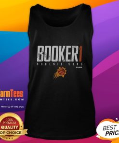 Devin Booker wearing a stylish Phoenix Suns tank top, showcasing team pride and sports fashion for fans.