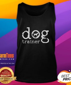 Friendly Labrador wearing a tank top at dog training school, showcasing a Golden Retriever's playful spirit.