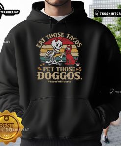 Adorable skeleton dog wearing a hoodie, enjoying tacos at a fun pet-friendly event - Nice Eat Those Tacos!