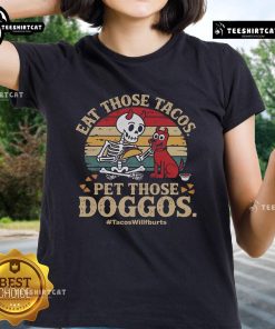 Skeleton dog graphic on a ladies tee featuring 'Nice Eat Those Tacos Pet Those Doggos' slogan - perfect for taco lovers!