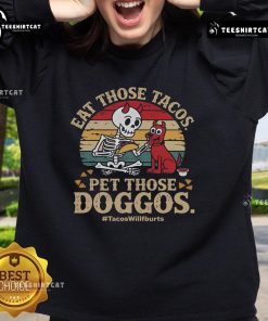 Cute skeleton dog sweatshirt featuring 'Nice Eat Those Tacos, Pet Those Doggos' design, perfect for taco lovers.