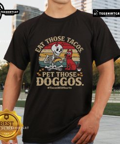 Skeleton dog t-shirt with 'Nice Eat Those Tacos Pet Those Doggos' slogan, perfect for taco lovers and dog enthusiasts.
