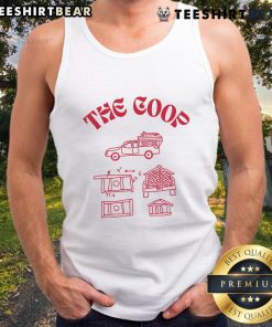 Stylish goth babe wearing The Coop tank top, showcasing edgy fashion and unique style in a vibrant outdoor setting.