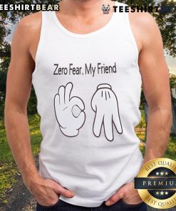 Person wearing a 'Zero Fear My Friend' tank top, making a nice hand sign, showcasing confidence and style.