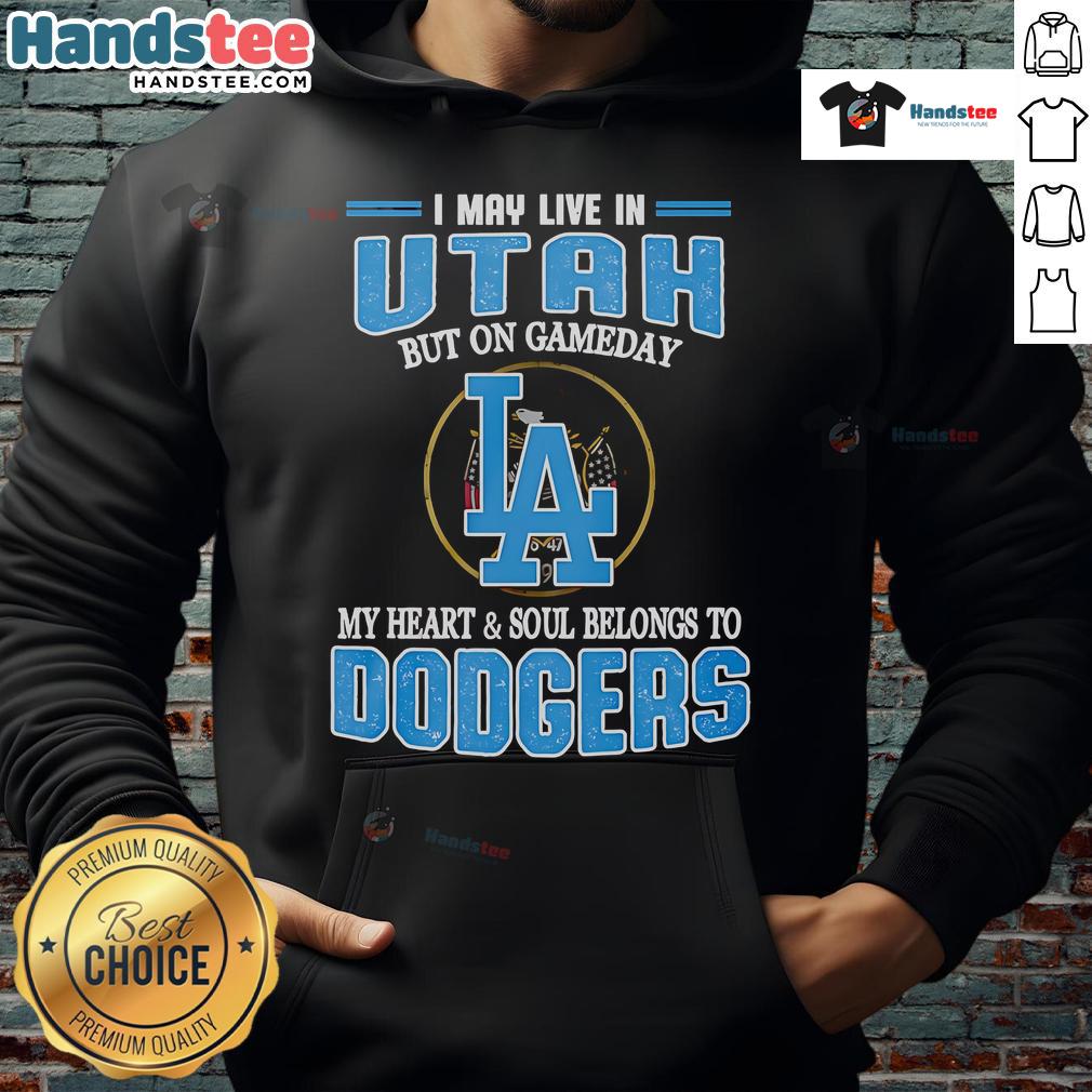 Nice I May Live In Utah But On Gameday My Heart And Soul Belongs To Dodgers Hoodie Alt Text: Person wearing a Dodgers hoodie in Utah, showcasing loyalty with text 'On Gameday, My Heart Belongs to Dodgers.'