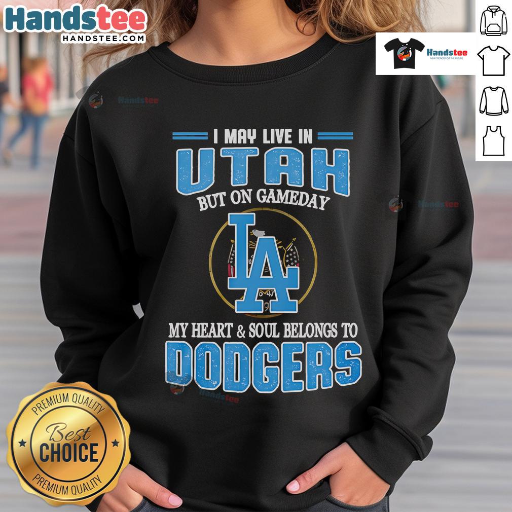 Nice I May Live In Utah But On Gameday My Heart And Soul Belongs To Dodgers Sweatshirt Cozy Dodgers sweatshirt with 'Nice, I May Live in Utah, But On Gameday My Heart and Soul Belongs to Dodgers' text.