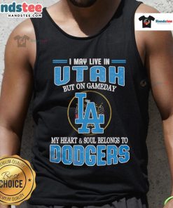Alt Text: Woman wearing a Dodgers tank top, expressing loyalty to the team despite living in Utah on game day.