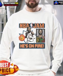 Jalen Brunson wearing a New York Knicks NBA Jam sweatshirt, showcasing team colors and retro design.