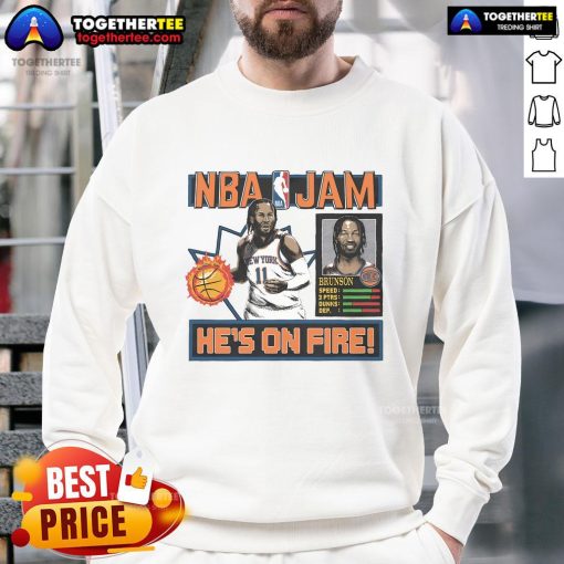 Jalen Brunson wearing a New York Knicks NBA Jam sweatshirt, showcasing team colors and retro design.