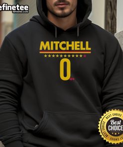 Kelsey Mitchell in a stylish Indiana Fever hoodie, showcasing team spirit and sporty fashion.
