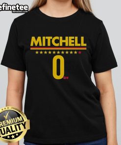 Alt Text: Kelsey Mitchell wearing a stylish Indiana Fever ladies tee, showcasing team spirit and fashion in vibrant colors.