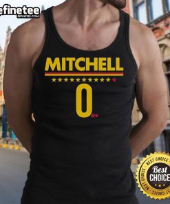 Alt Text: Kelsey Mitchell of the Indiana Fever wearing a stylish tank top during a game, showcasing her athleticism and team spirit.