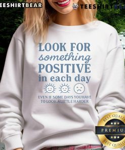 Alt Text: Cozy sweatshirt with Look for Something Positive in Each Day slogan, perfect for uplifting daily inspiration.