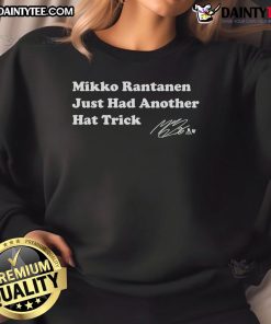 Alt Text: Mikko Rantanen wearing a sweatshirt celebrating his latest hat trick in a Colorado Avalanche game.