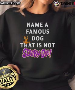 Alt Text: Cozy sweatshirt featuring a famous dog design, perfect for fans of pet apparel, not Scooby-Doo.