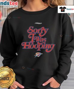 Nice Oklahoma City Thunder 'Sorry I Was Hooping' sweatshirt displayed on a hanger, showcasing team spirit and style.
