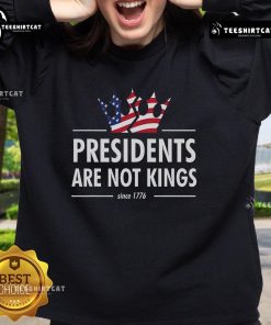 Alt Text: USA flag sweatshirt with 'Nice Presidents Are Not Kings' slogan, celebrating American values since 1776.