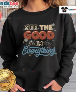 Cozy sweatshirt featuring 'See The Good In Everything' design, perfect for uplifting casual wear and positivity.