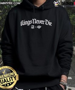 Alt Text: Snoop Dogg wearing a Kings Never Die hoodie featuring 2Pac, showcasing Los Angeles Kings pride and hip-hop culture.