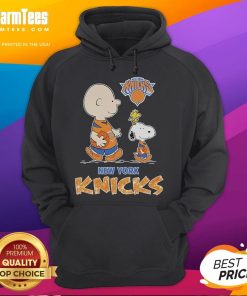 Snoopy and Charlie Brown in a New York Knicks hoodie, featuring colorful Peanuts characters on a cozy design.