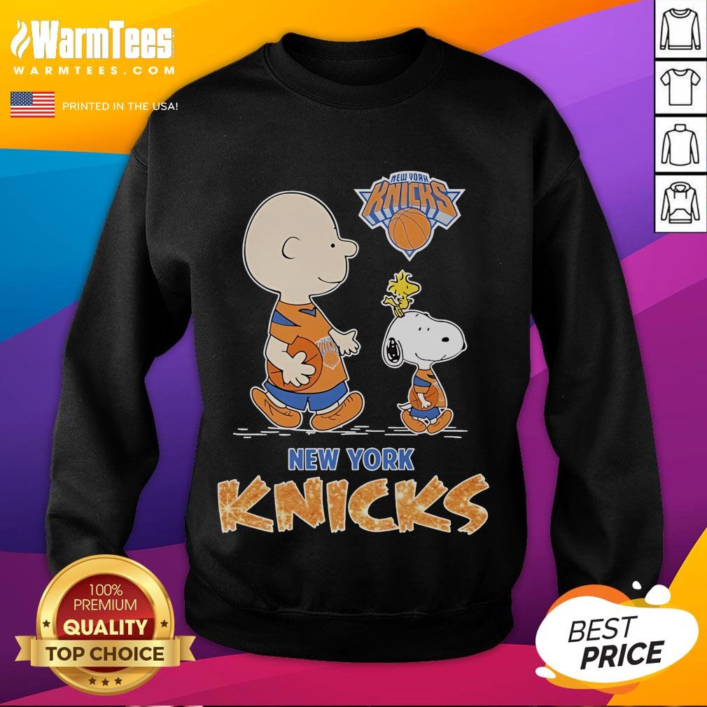Nice Snoopy And Charlie Brown The Peanuts New York Knicks Sweatshirt Snoopy and Charlie Brown on a New York Knicks sweatshirt, perfect for Peanuts fans and sports apparel collectors.