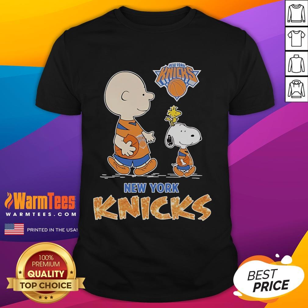 Nice Snoopy And Charlie Brown The Peanuts New York Knicks T Shirt Nice Snoopy and Charlie Brown The Peanuts New York Knicks T-shirt featuring iconic characters in vibrant team colors.