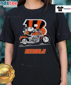 Snoopy and Woodstock riding a motorbike on a Cincinnati Bengals ladies tee, showcasing fun team spirit and style.