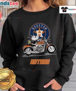 Snoopy and Woodstock driving a motorbike on a Houston Astros sweatshirt, showcasing fun, vibrant design.