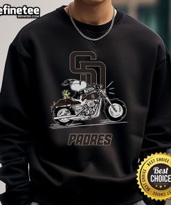 Snoopy and Woodstock driving a motorbike on a San Diego Padres sweatshirt, showcasing fun cartoon style.