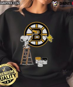 Snoopy and Woodstock painting on a Boston Bruins logo sweatshirt, showcasing a fun and unique sports apparel design.