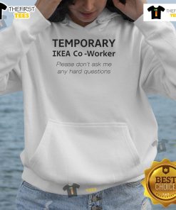 Alt Text: Co-worker wearing a 'Nice Temporary IKEA' hoodie, showcasing a playful design, perfect for casual work environments.