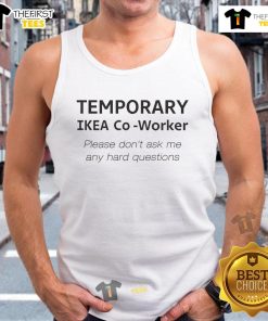 Nice temporary Ikea co-worker wearing a tank top, smiling and ready to assist without hard questions.