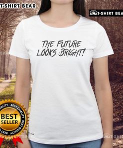 Women wearing 'Nice The Future Looks Bright' tee, showcasing a vibrant design and positive message in a casual setting.