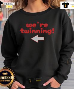 Two friends wearing matching sweatshirts for Twin Day during Spirit Week, showcasing their 'Nice Twinning' style.