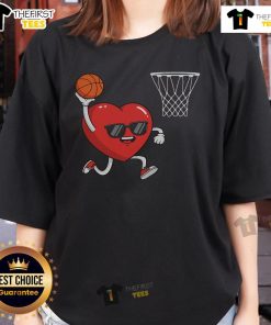 Cute Valentine's Day heart playing basketball on a ladies tee, perfect for sports-loving romantics.