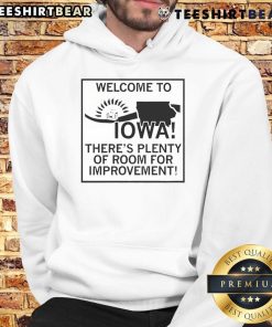Cozy hoodie with 'Welcome to Iowa, There's Plenty of Room for Improvement' slogan, perfect for Iowa pride.