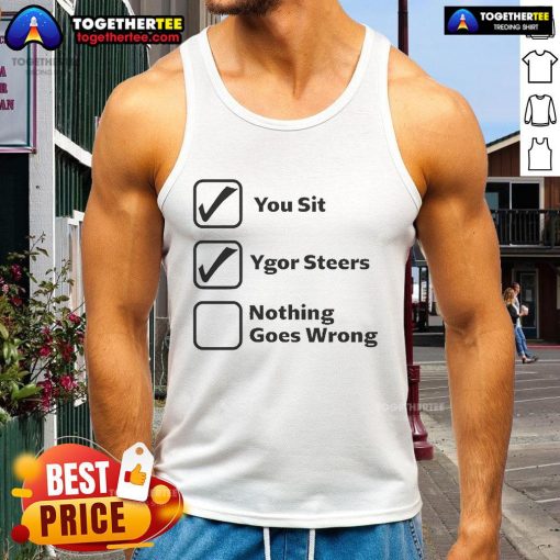 Ygor steers confidently in a stylish 'Nice You Sit' tank top, showcasing a relaxed and carefree vibe.