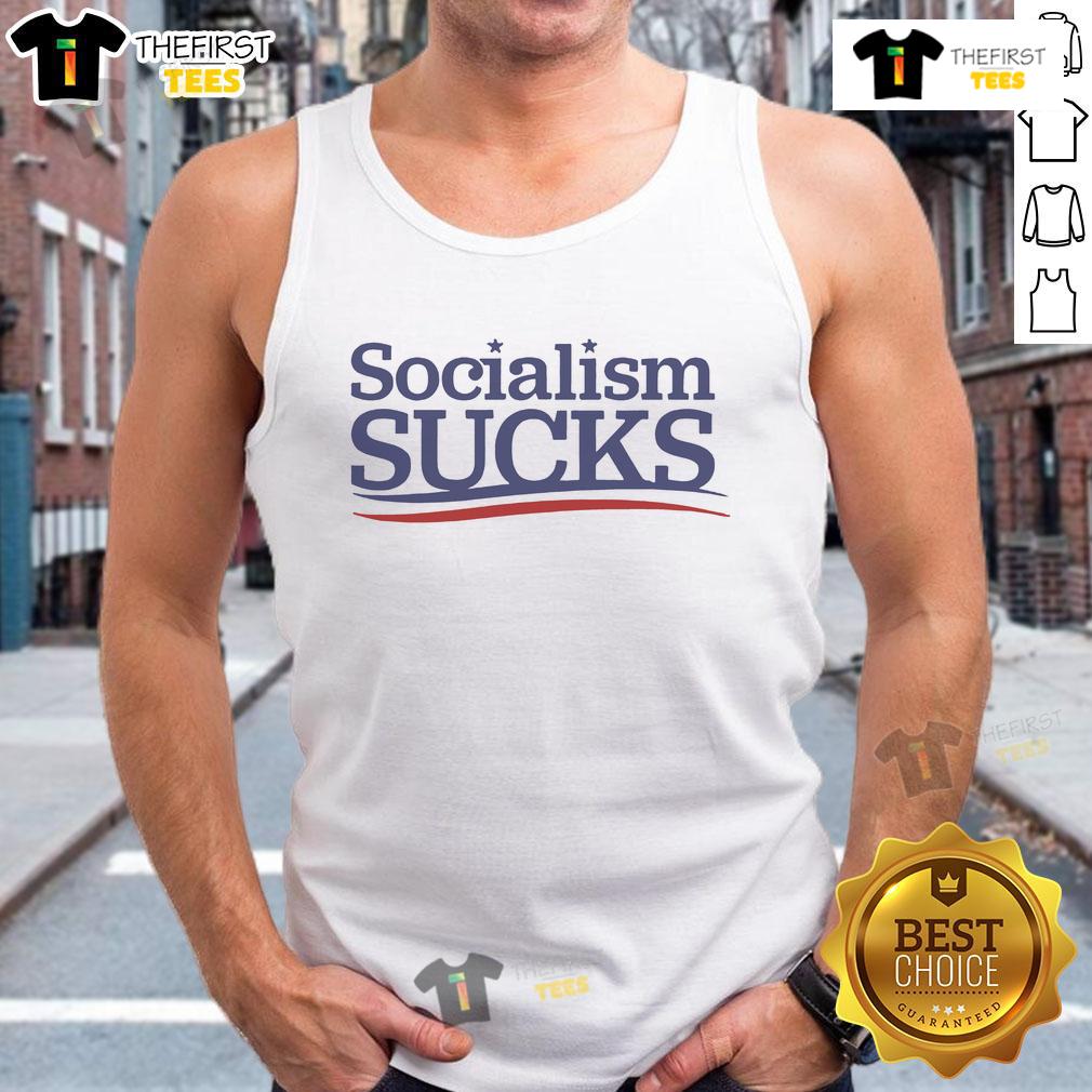Official Adrianne Curry Socialism Sucks Tank Top Adrianne Curry wearing a 'Socialism Sucks' tank top, showcasing her bold style and political stance.